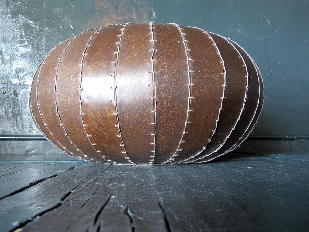 CLOVES vase ,hand made from iron and fishing net strings diam30x56cm h, diam 56x28 cm h.